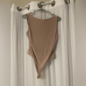 Squareneck bodysuit with button closure.